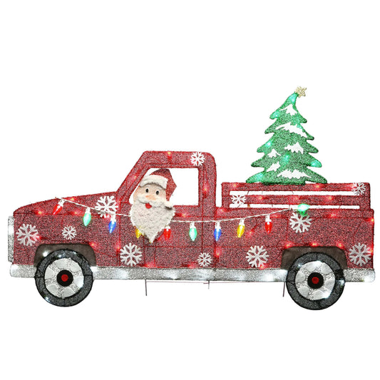 Santa Claus driving a bright red truck