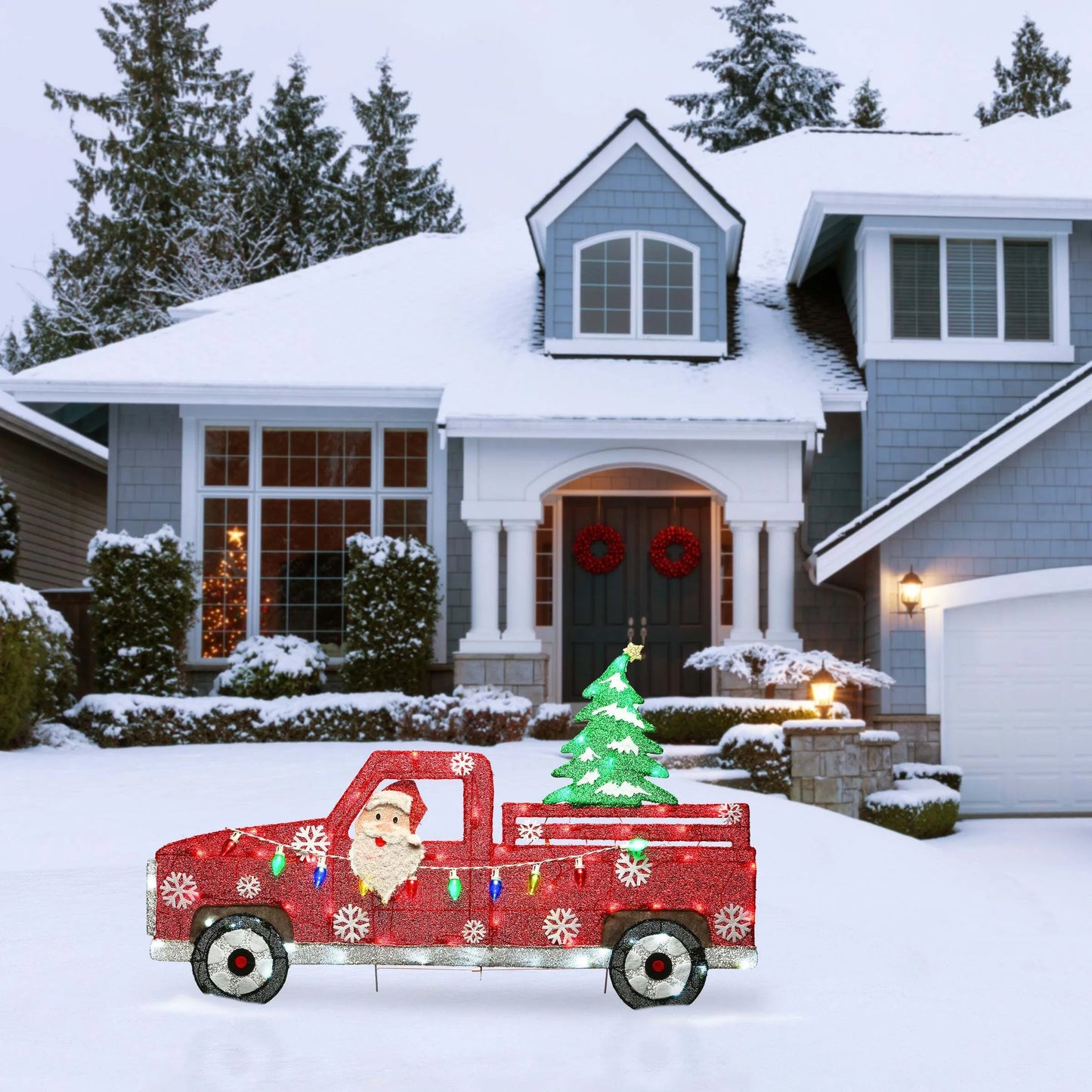 Santa Claus driving a bright red truck